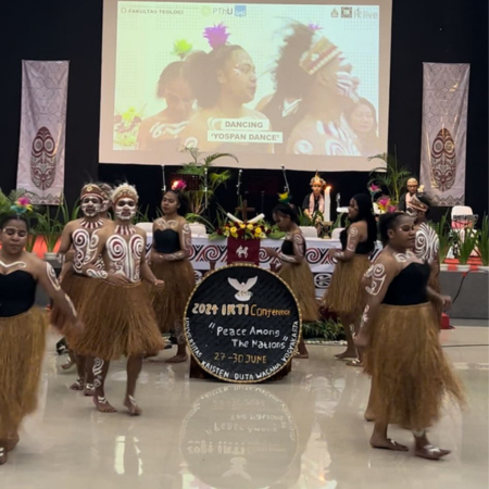 Dancers performing the Yospan dance at the IRTI conference 2024.